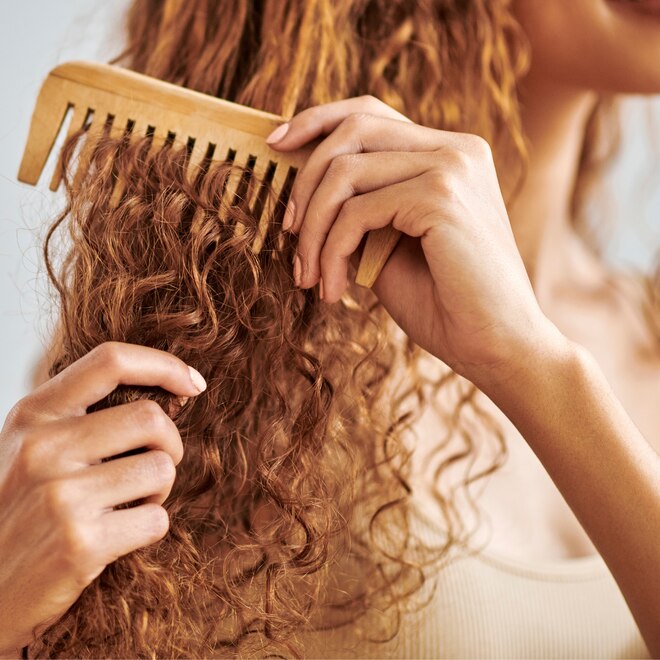 This $8 Drugstore Leave-In Conditioner Gives My Curly Hair Life